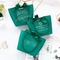 Bolsas de papel del verde lima de la impresión de la planta tropical con las manijas de la cinta