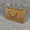 200pcs a la cinta de las bolsas de papel de la ropa del sellado de oro 500pcs maneja bolsos de compras de Kraft